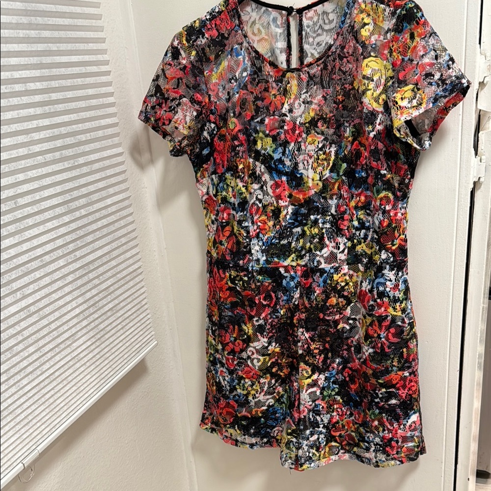 Jumpsuit Short sleeves. Perfect for any occasion. Zipper back. Lined. Size 10